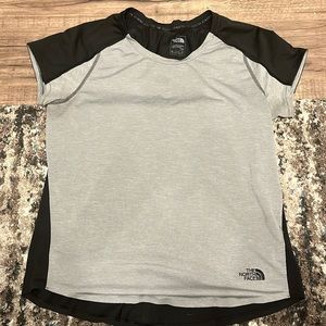 Sweat wicking, black and white stripped size L. Perfect for hiking, working out